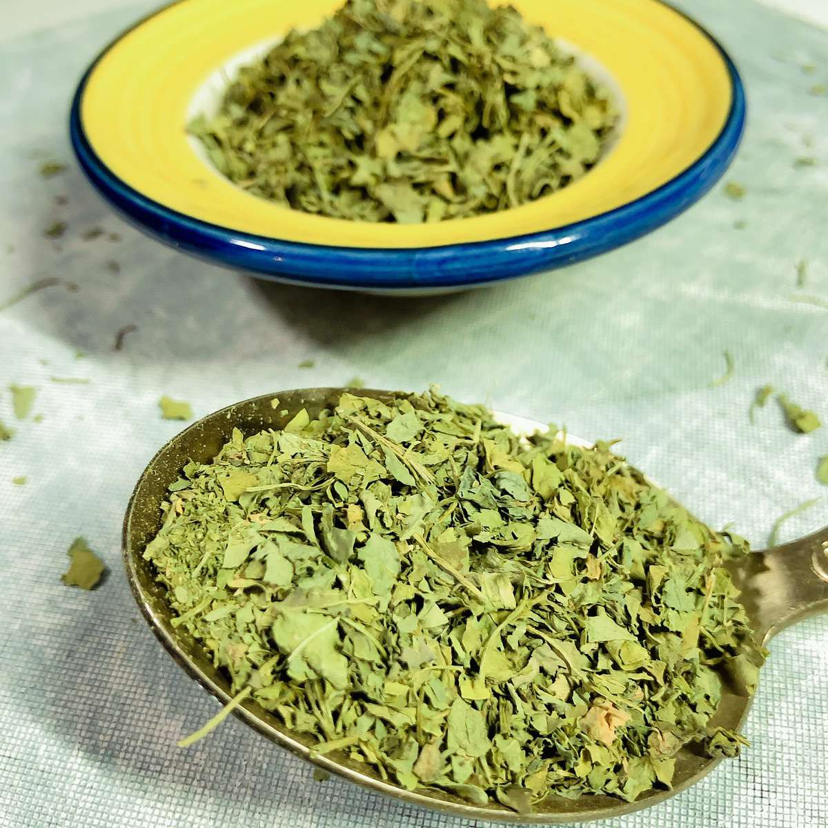 Dried fenugreek leaves in a bowl min