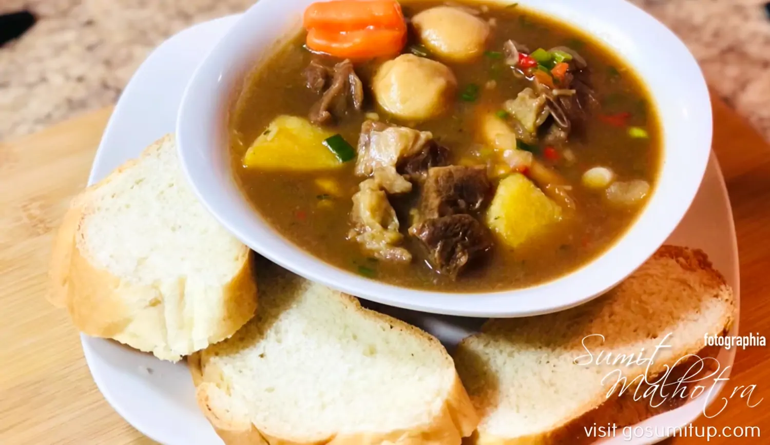 Antiguan Goat Water Served with Bread webp webp